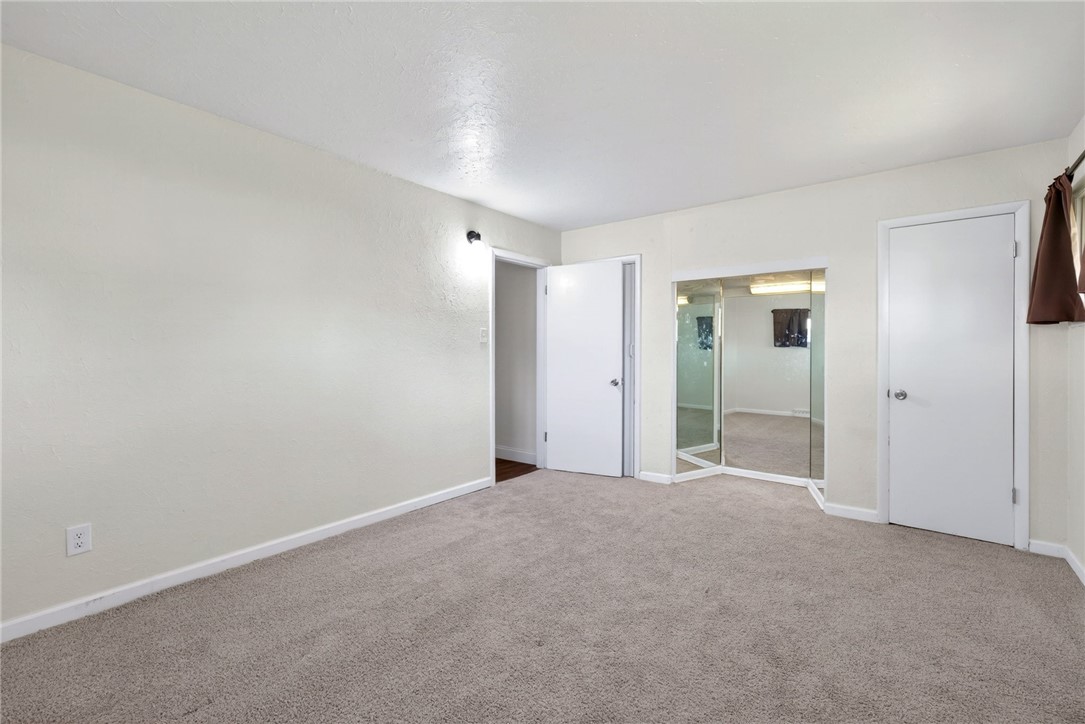 2684 Arthur Road Springfield, OH 45502 - Photo 30 of 69 This spacious bedroom offers ample natural light and a neutral palette, awaiting your personal touch.