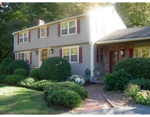 89 Ortins Road Hamilton, MA 01982 - Photo 1 of 8 a front view of a house with garden