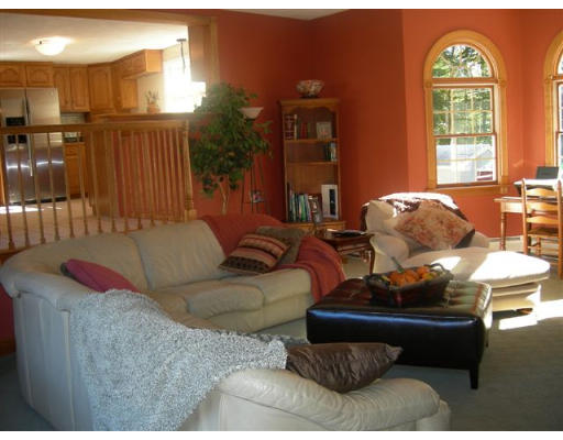 89 Ortins Road Hamilton, MA 01982 - Photo 2 of 8 a living room with furniture and a large window
