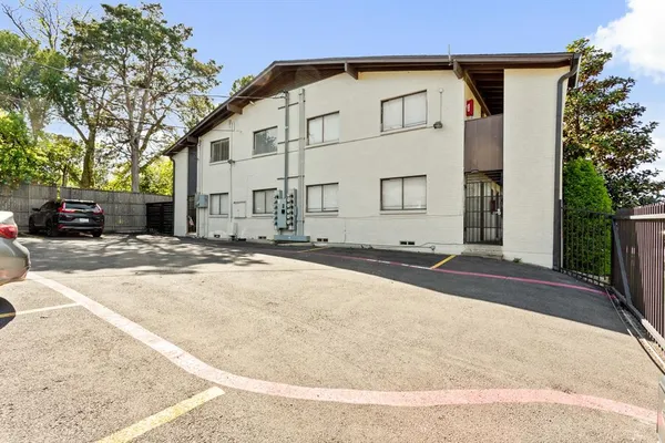 a view of building with a street