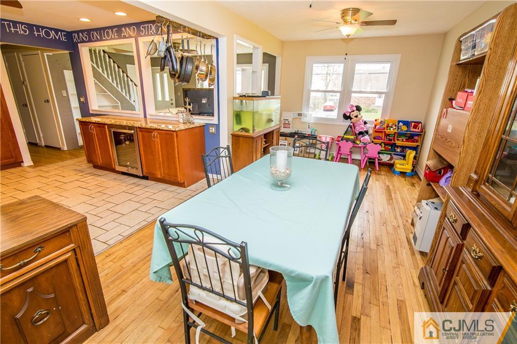20 North Pennington Road New Brunswick, NJ 08901 - Photo 8 of 25 a view of a dining room with furniture window and wooden floor