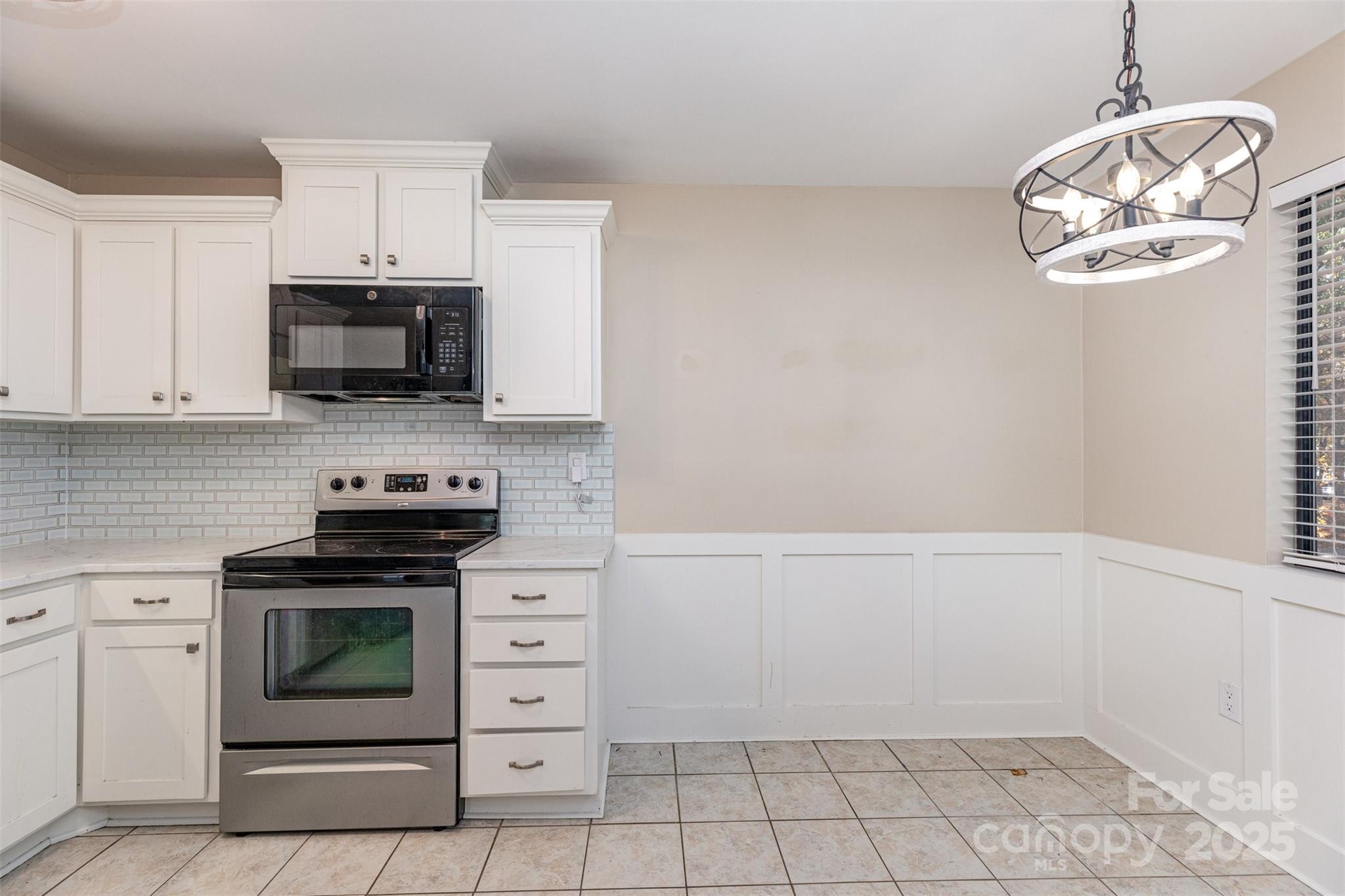 1778 Hunters Trail Rock Hill, SC 29732 - Photo 3 of 24 a kitchen with cabinets and steel stainless steel appliances