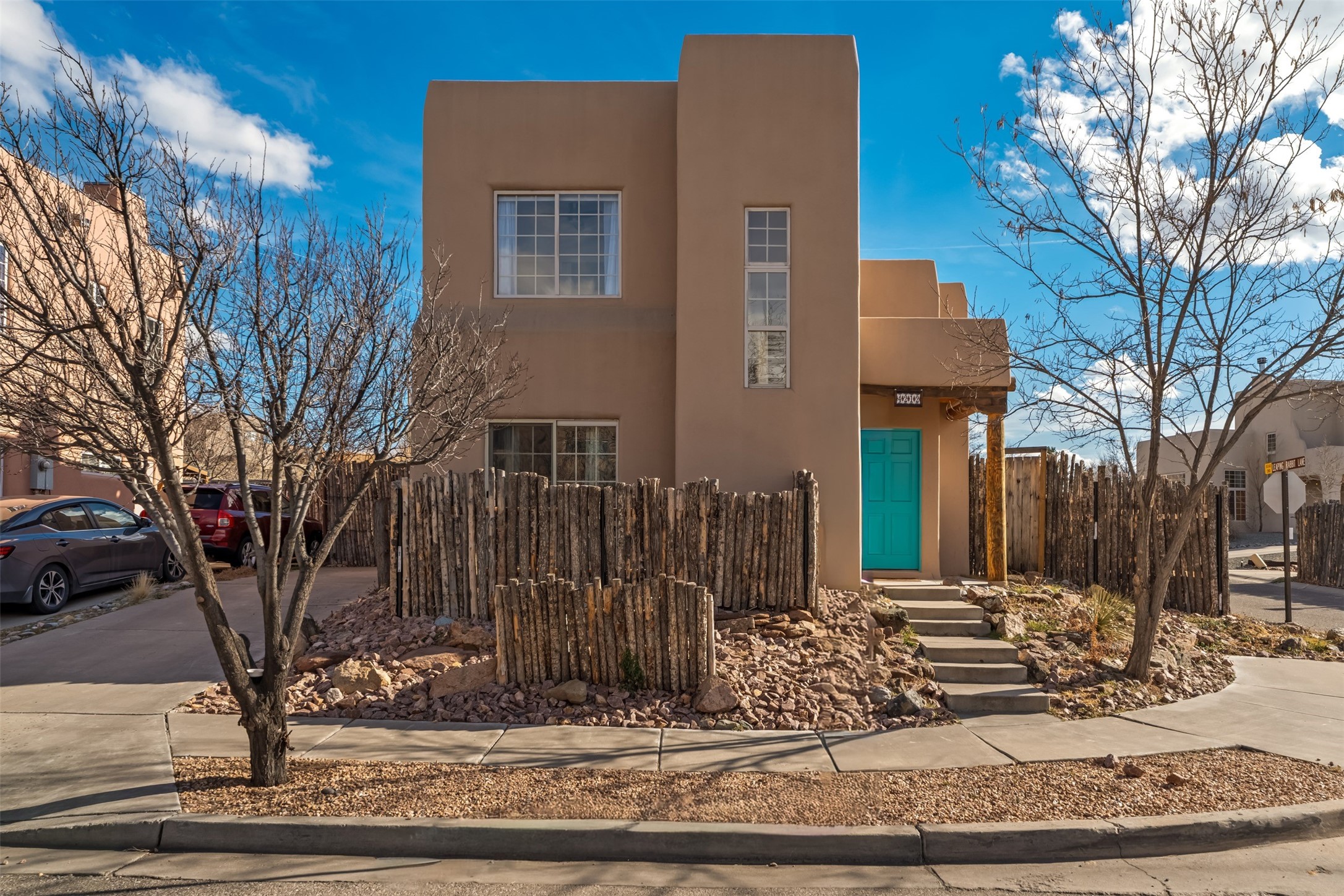 4212 Big Sky Road Santa Fe, NM 87507 - Photo 1 of 1 Front of the house, from Big Sky Road