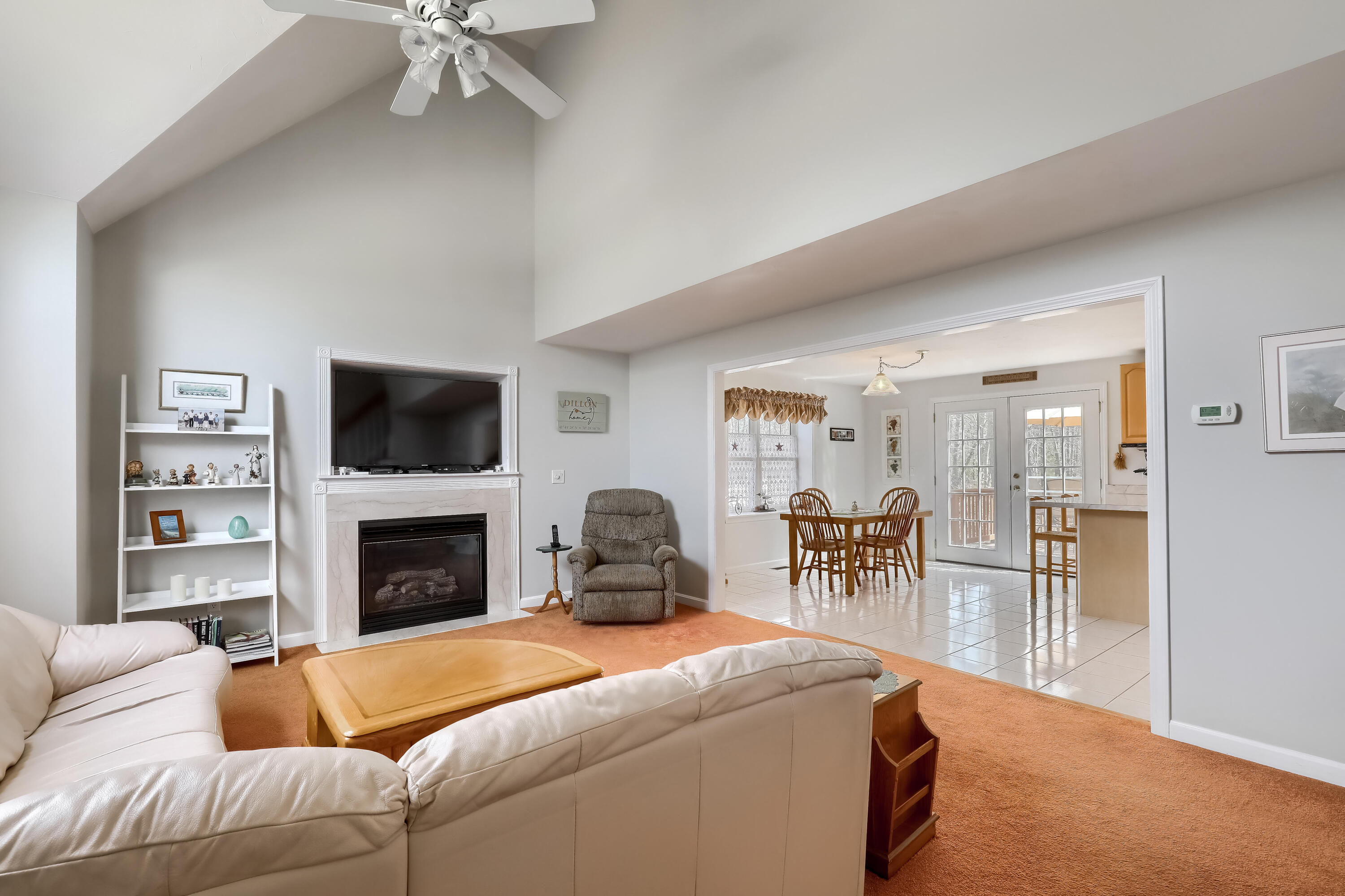 57 Fox Hill Road Mashpee, MA 02649 - Photo 5 of 23 a living room with furniture and a fireplace