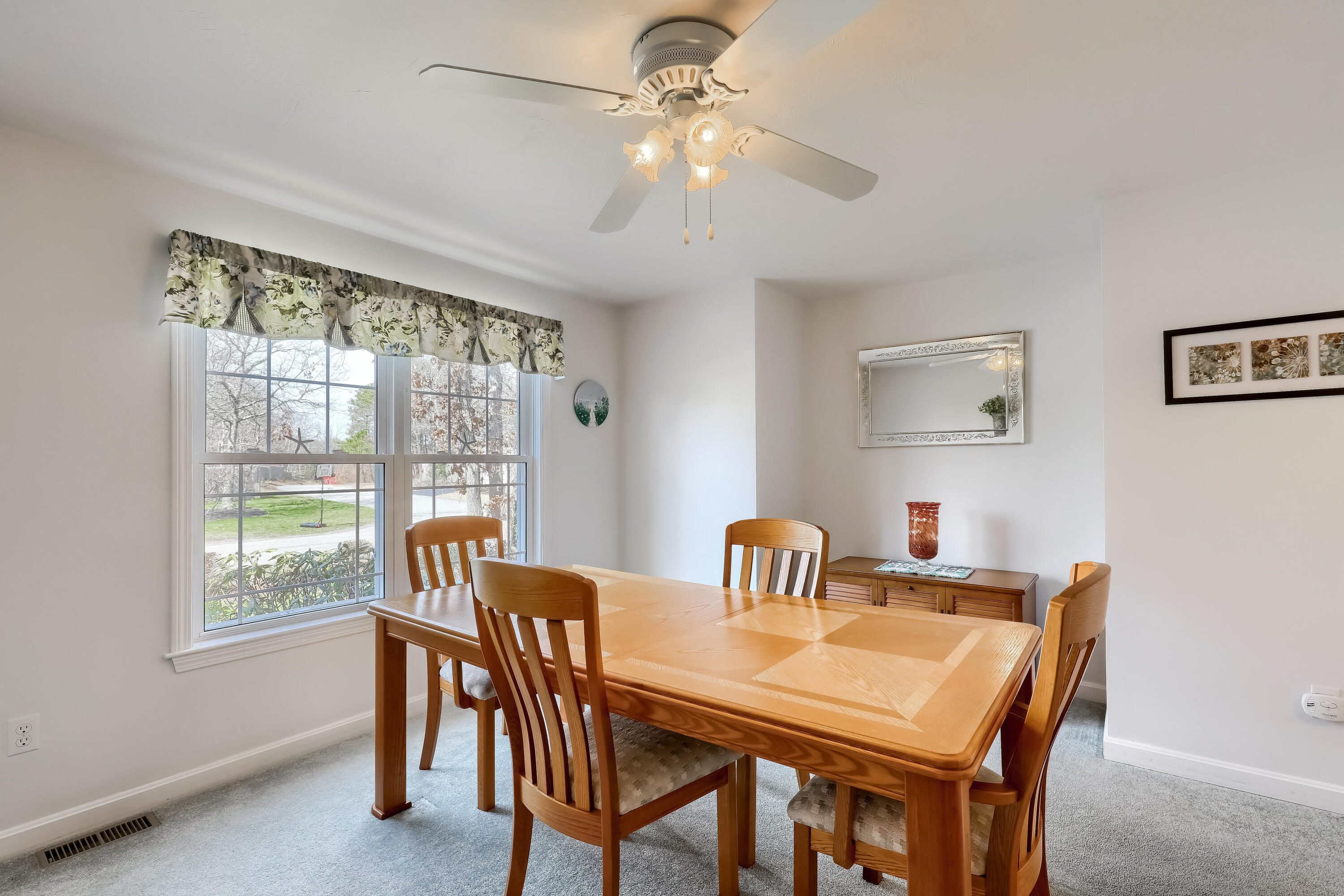 57 Fox Hill Road Mashpee, MA 02649 - Photo 9 of 23 a view of a dining room with furniture window and outside view