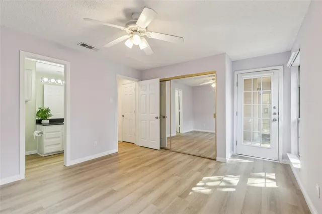 wooden floor in an empty room with a workspace