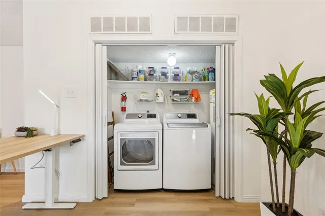 a utility room with dryer and washer
