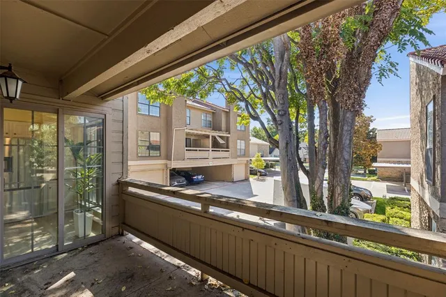 a kitchen with a large window and a sink