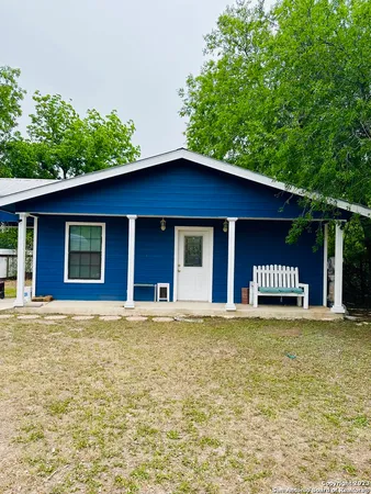 a view of a house with a garden