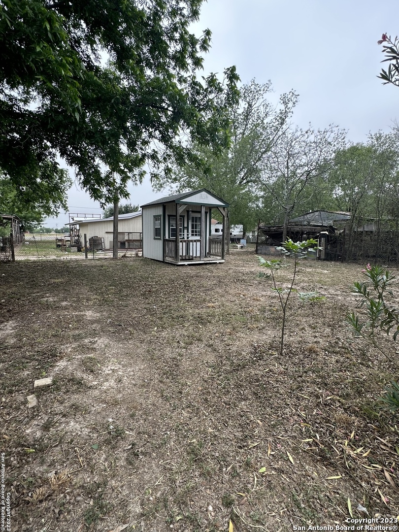 429 Wingate Street La Pryor, TX 78872 - Photo 12 of 14 a front view of a house with a yard