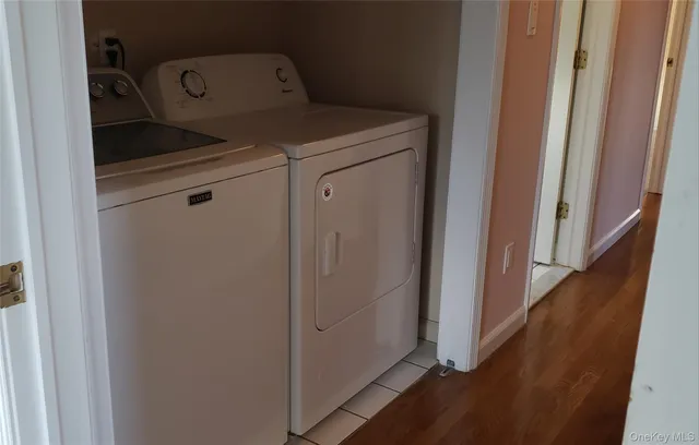 a utility room with washing machine
