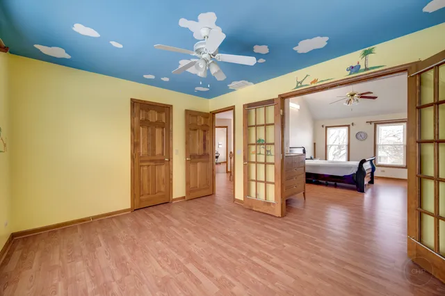 a view of livingroom with hardwood floor and ceiling fan