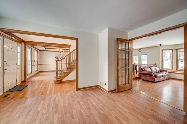 a view of a living room and hardwood floor