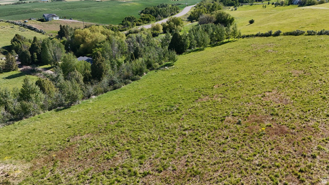 1398 Mogul Lane, Unit 1 Inkom, ID 83245 - Photo 26 of 33 Expansive grassy terrain with rolling hills and distant agricultural fields