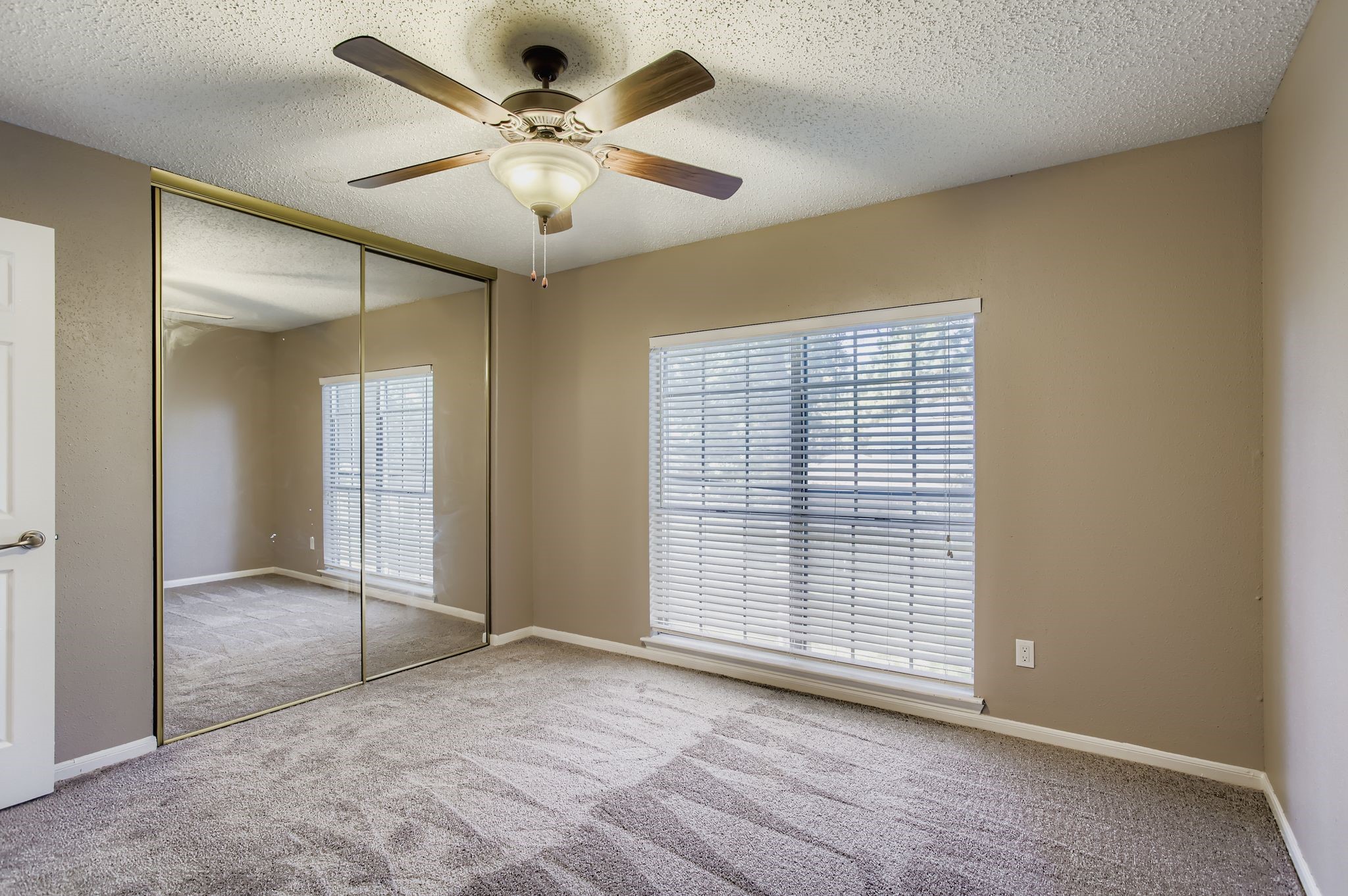 7519 Sunlight Lane Houston, TX 77095 - Photo 21 of 27 an empty room with fan