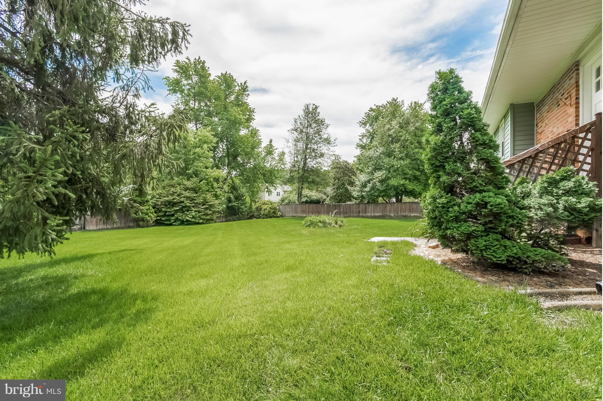 14517 Cobblestone Drive Silver Spring, MD 20905 - Photo 27 of 30 a view of a golf course with a lake