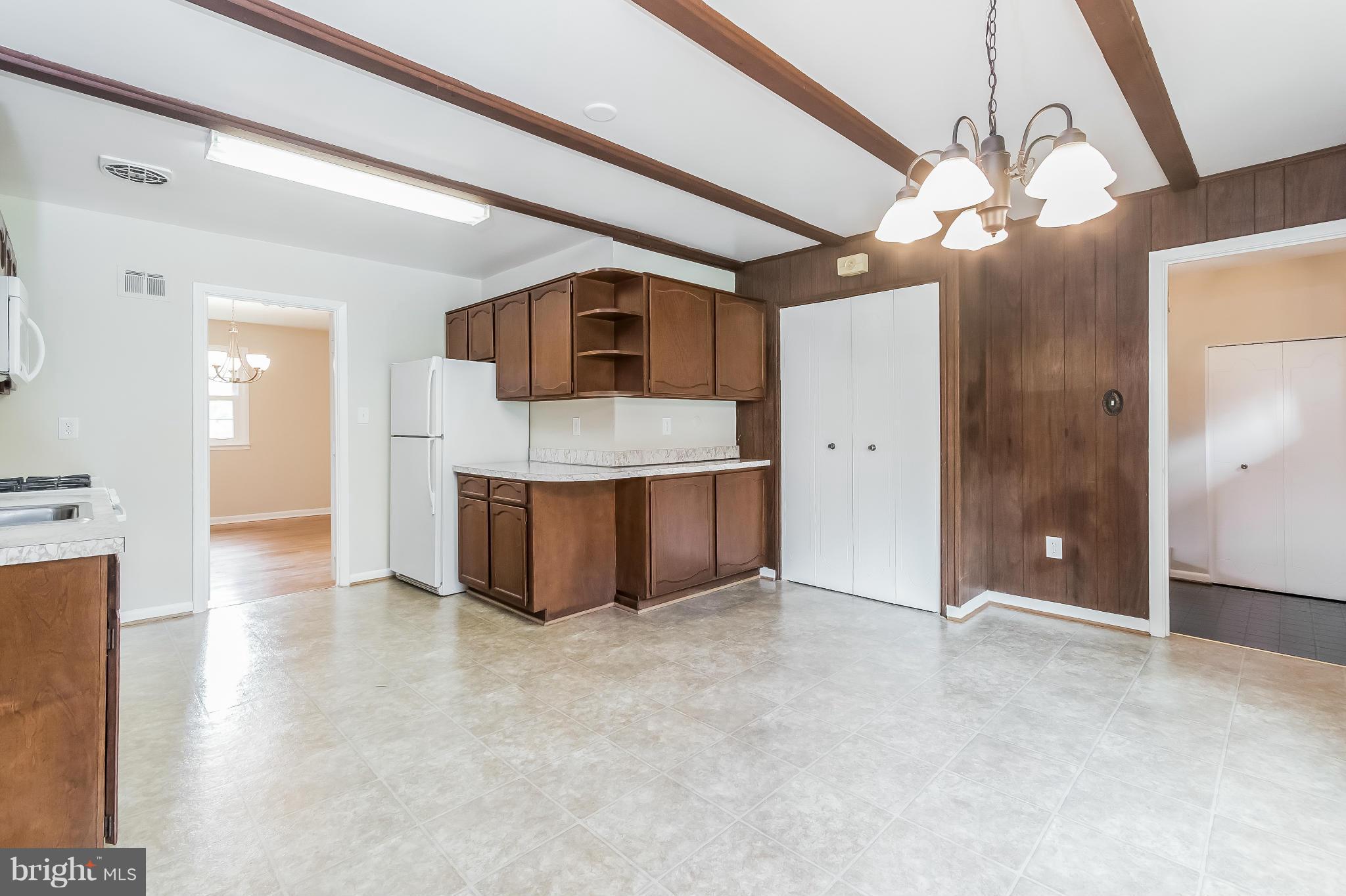 14517 Cobblestone Drive Silver Spring, MD 20905 - Photo 5 of 30 a view of a kitchen with a sink and cabinet