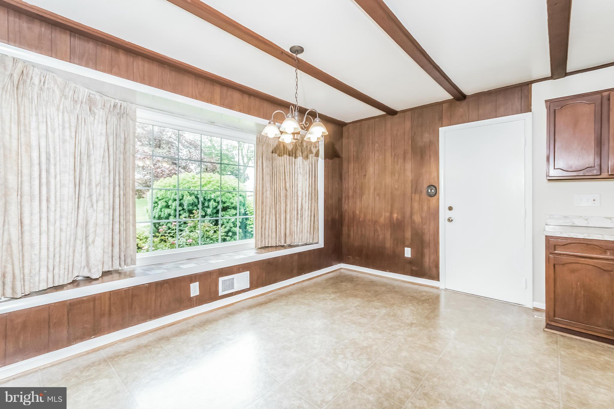 14517 Cobblestone Drive Silver Spring, MD 20905 - Photo 6 of 30 a view of an empty room with a window