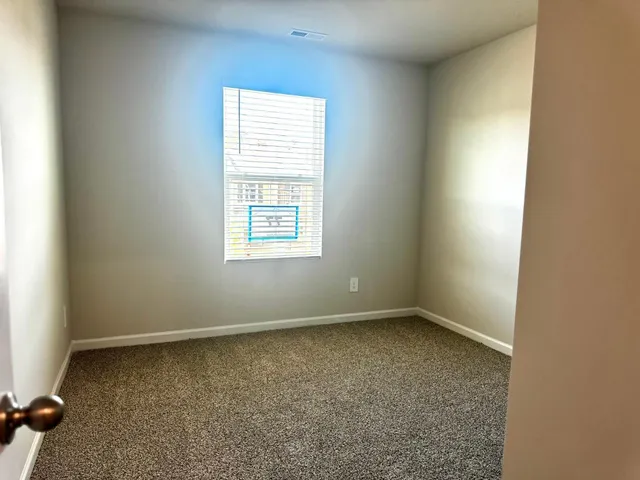 an empty room with closet