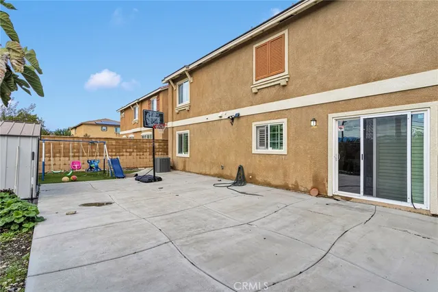 a backyard of a house with yard and garage
