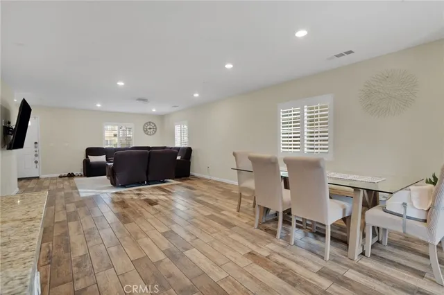 a kitchen with furniture and a table