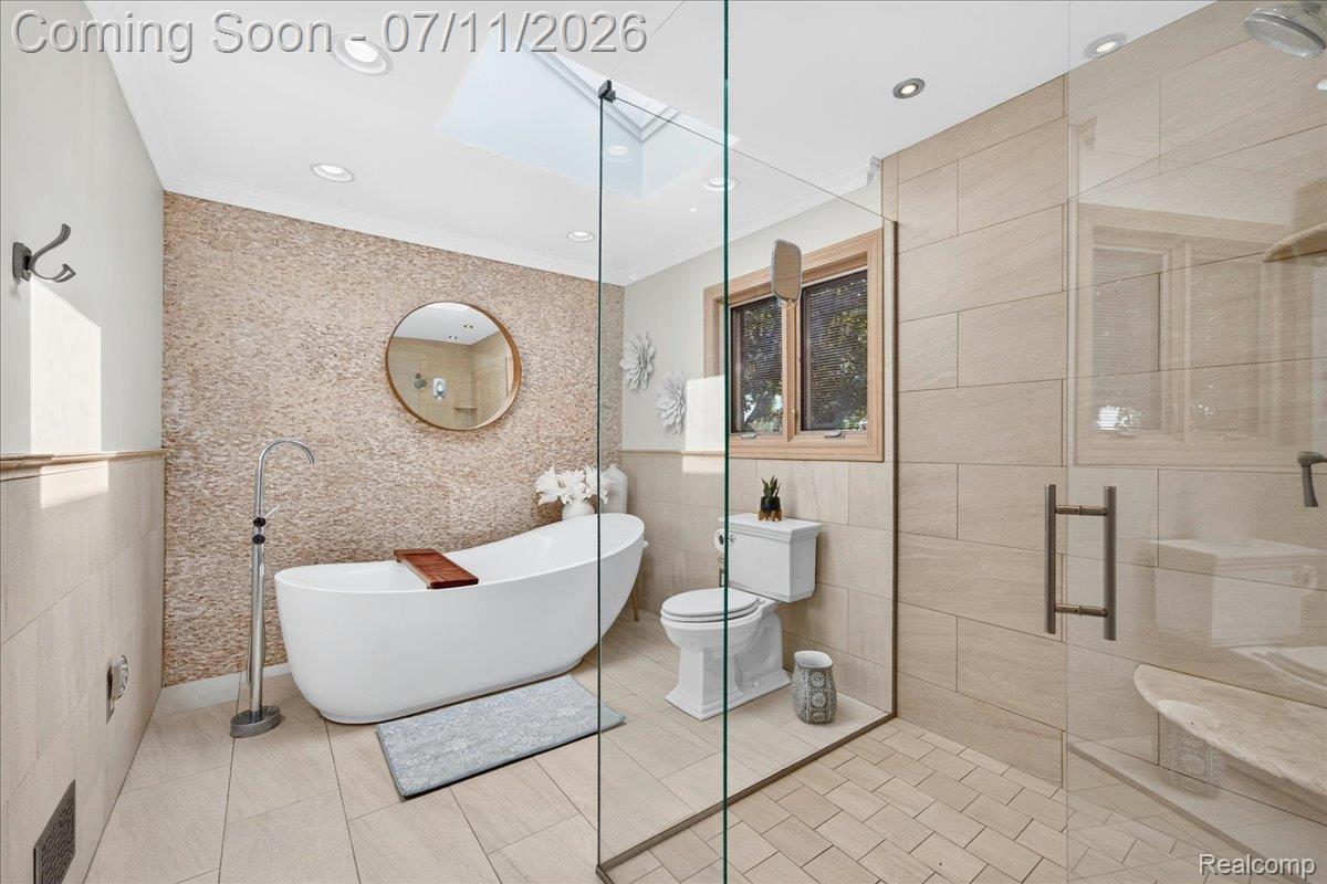 23750 East River Road Grosse Ile, MI 48138 - Photo 25 of 54 Freestanding soaking tub with floor-mounted faucet
