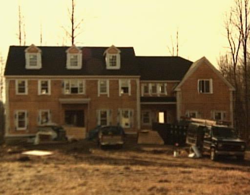 10 Nursery Road Ridgefield, CT 06877 - Photo 1 of 1 a front view of a house with a yard