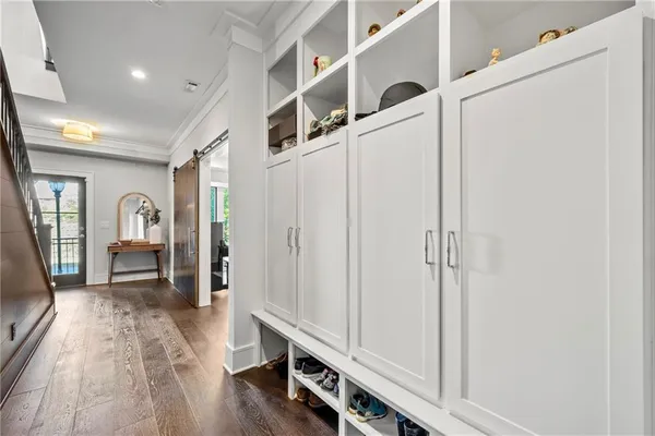 a view of a hallway with workspace