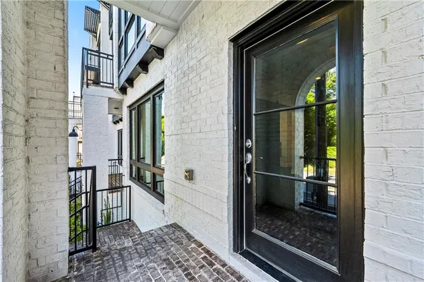 a front view of a house with a glass door