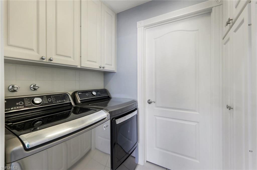 3462 Bravada Way Naples, FL 34119 - Photo 23 of 35 a close view of utility and stove in kitchen