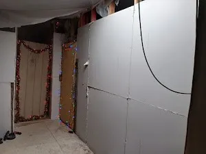 a view of a room with an entryway