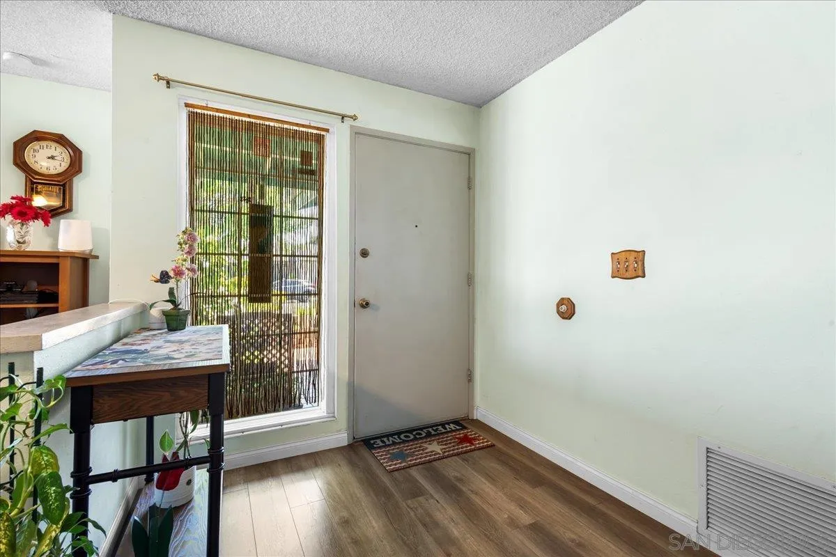 10738 2nd Street Santee, CA 92071 - Photo 2 of 52 a workspace with furniture and window