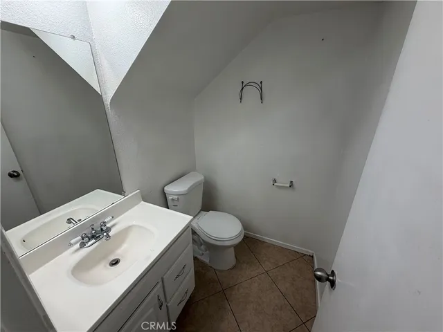 a bathroom with a sink and toilet