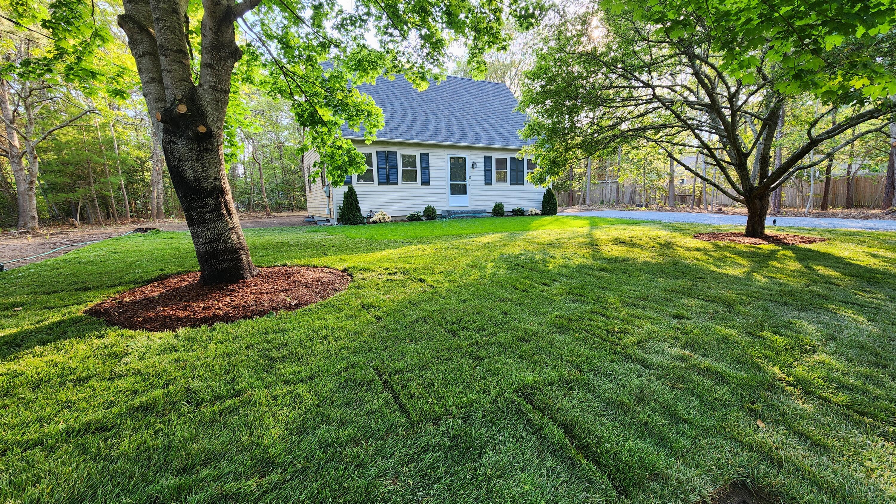147 Chippingstone Road Marstons Mills, MA 02648 - Photo 2 of 23 a view of a house with a yard