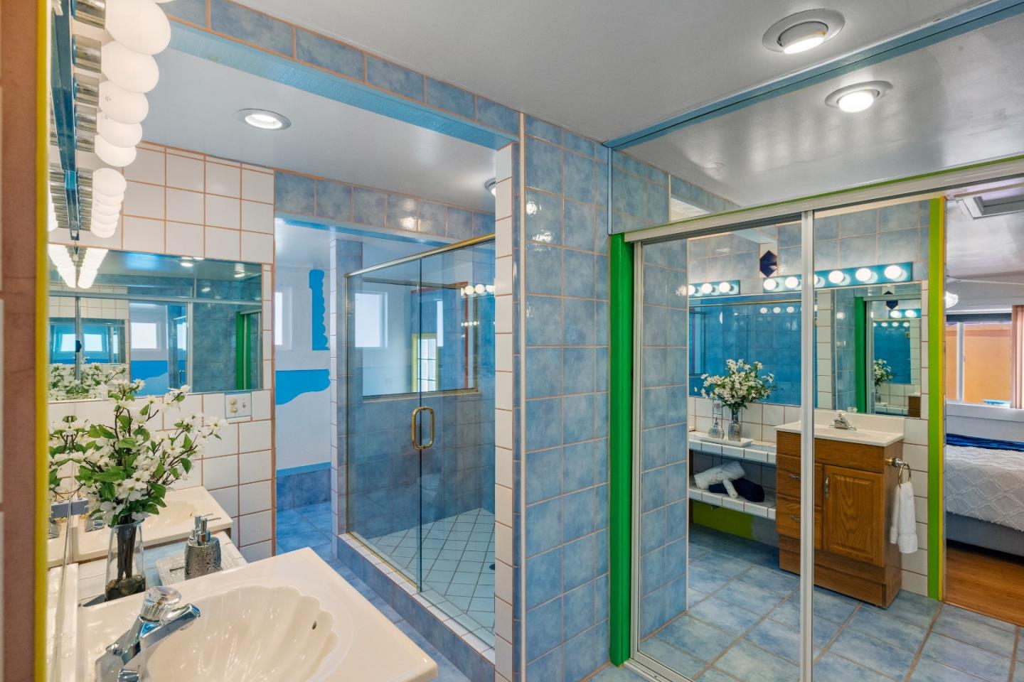 309 9th Street Pacific Grove, CA 93950 - Photo 13 of 36 a bathroom with a tub shower and sink