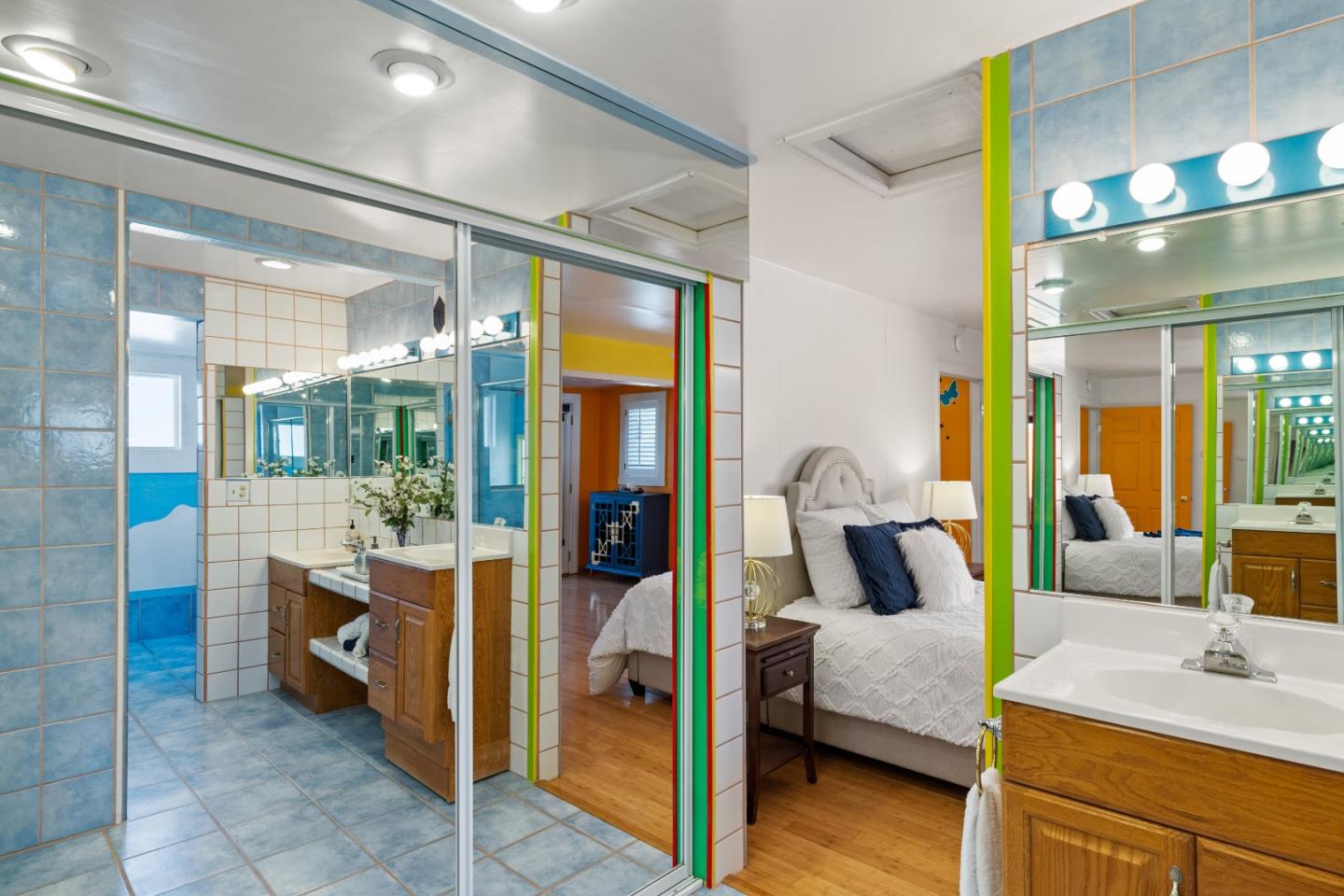 309 9th Street Pacific Grove, CA 93950 - Photo 15 of 36 a bedroom with a bed and wooden floor
