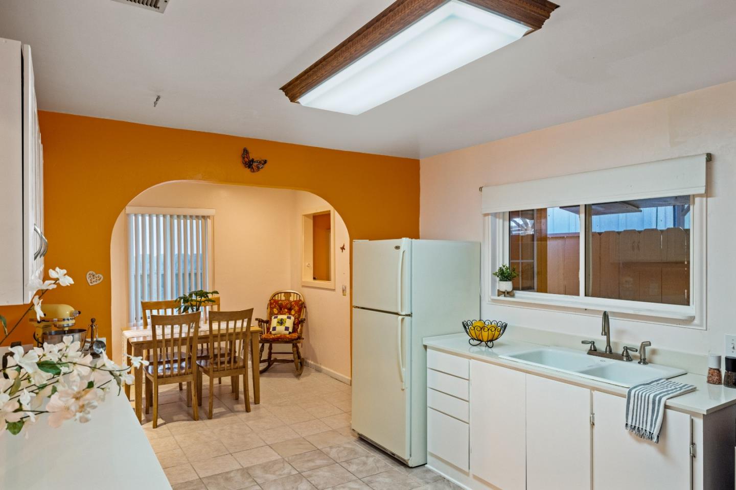 309 9th Street Pacific Grove, CA 93950 - Photo 23 of 36 a kitchen with appliances a sink and cabinets