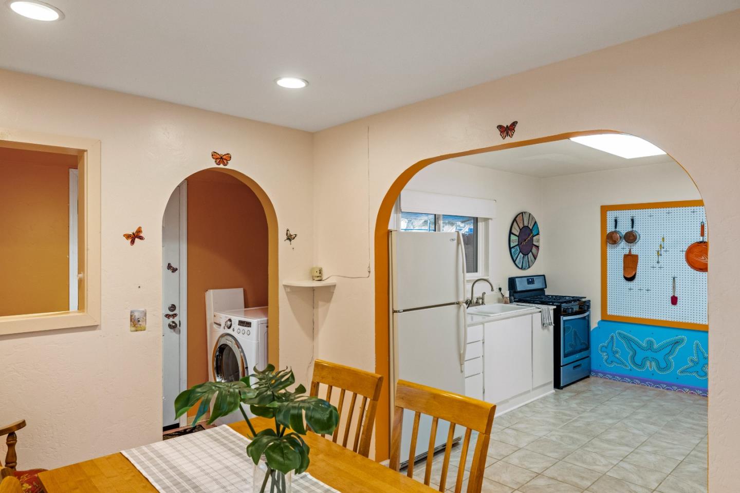 309 9th Street Pacific Grove, CA 93950 - Photo 26 of 36 a view of a kitchen with furniture and staircase