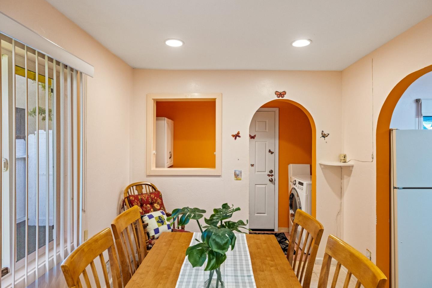 309 9th Street Pacific Grove, CA 93950 - Photo 27 of 36 a close view of a dining room with a table and chairs