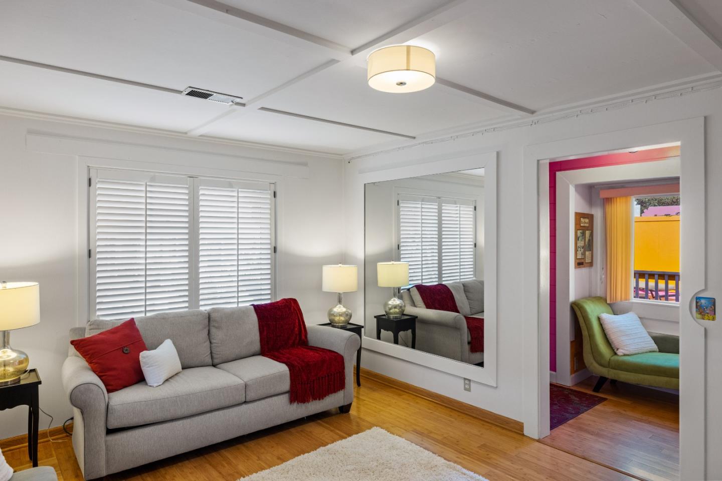 309 9th Street Pacific Grove, CA 93950 - Photo 3 of 36 a living room with furniture and a large window
