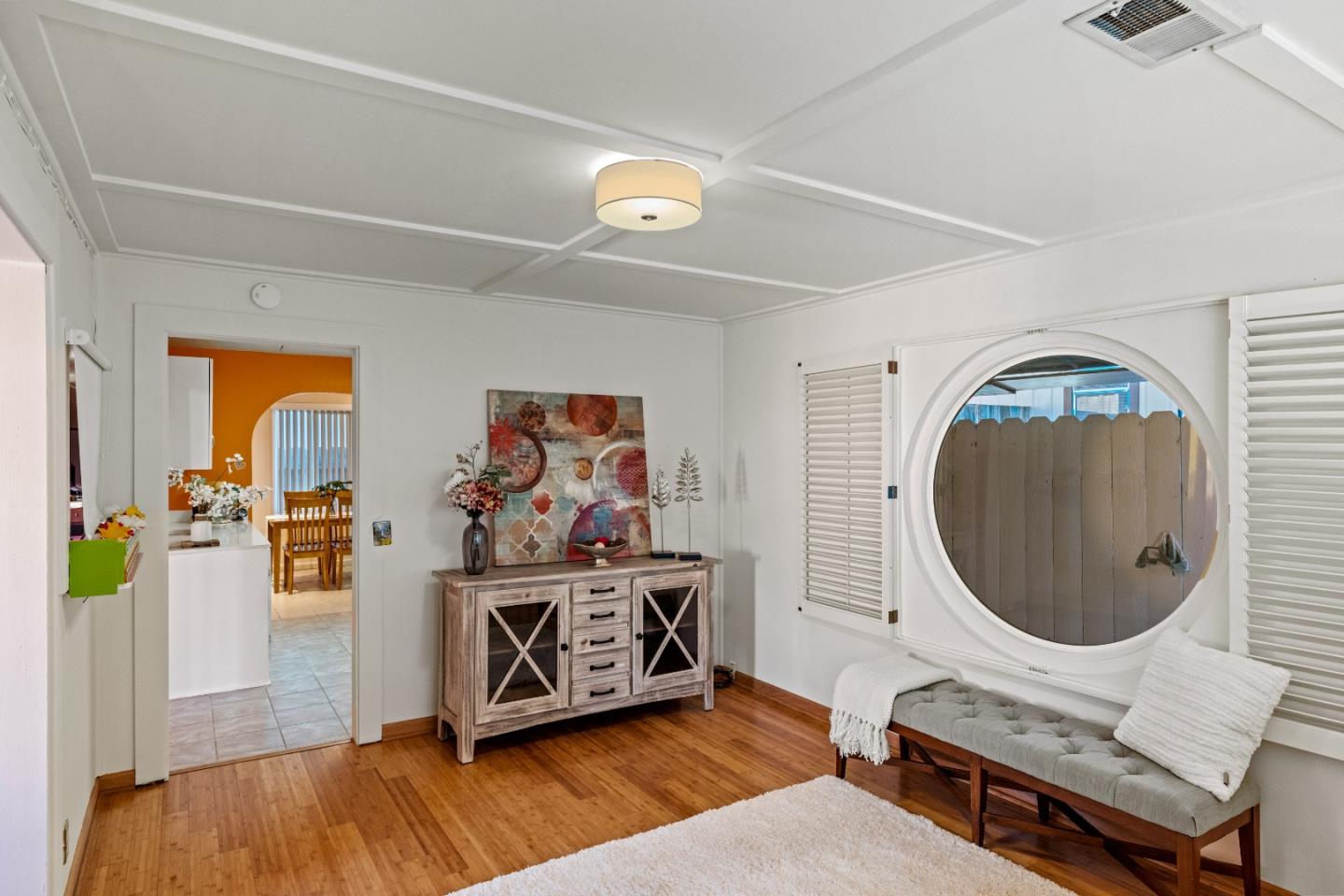 309 9th Street Pacific Grove, CA 93950 - Photo 6 of 36 a living room with furniture and a wooden floor
