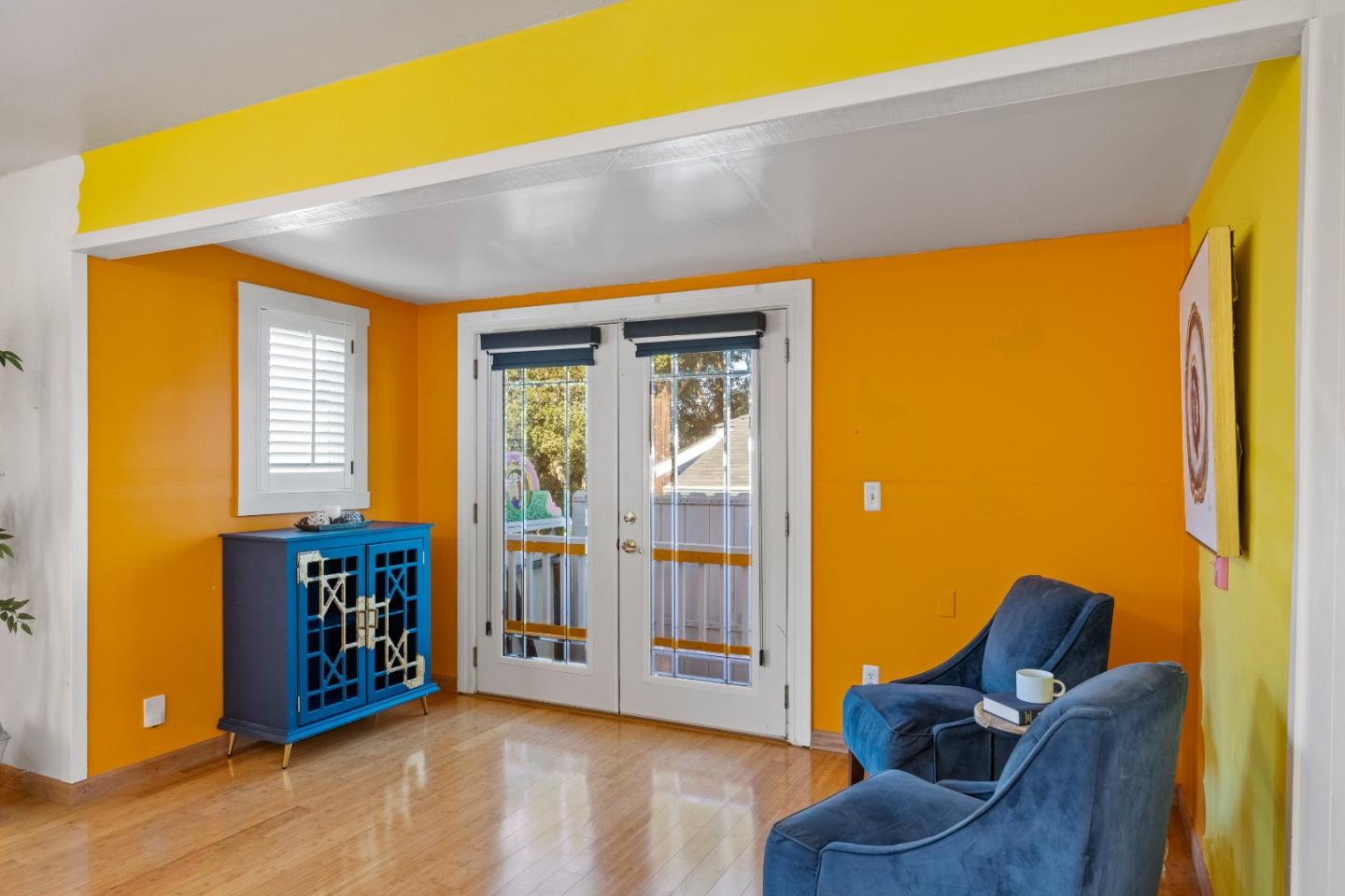 309 9th Street Pacific Grove, CA 93950 - Photo 10 of 36 a living room with furniture and large window