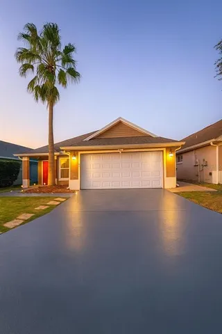 a view of a house with a swimming pool