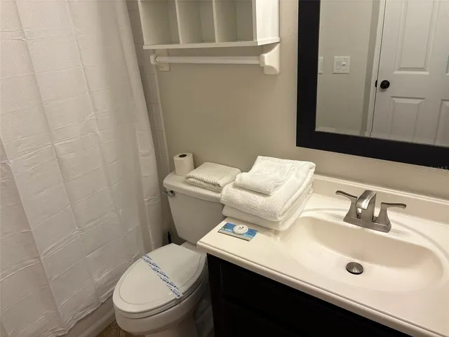 a bathroom with a sink and a toilet