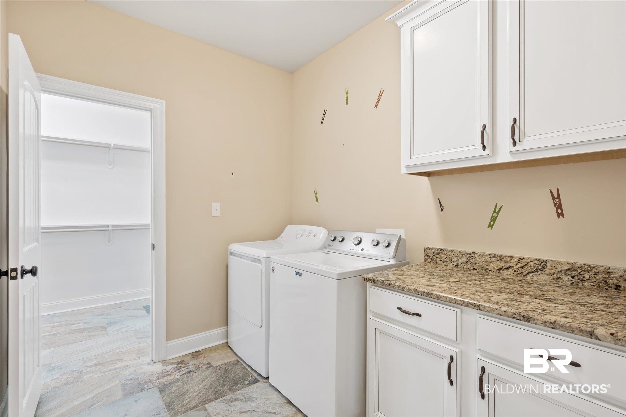423 Breckin Drive Fairhope, AL 36532 - Photo 8 of 31 Washroom featuring cabinets and washer and dryer