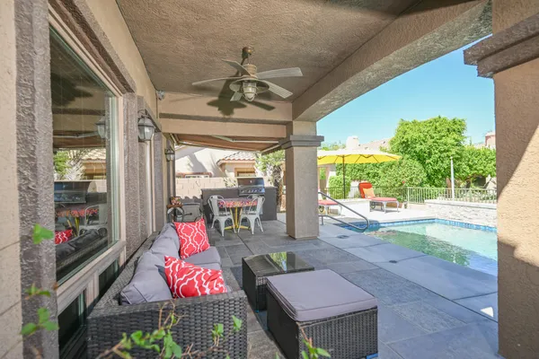 a outdoor space with patio couch and wooden floor