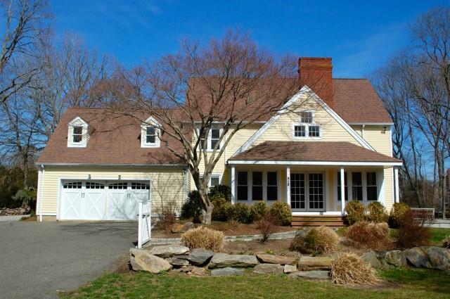 510 Hulls Farm Road Fairfield, CT 06890 - Photo 1 of 1 a front view of a house with a yard outdoor seating and yard