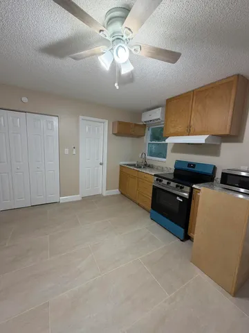a view of kitchen with furniture