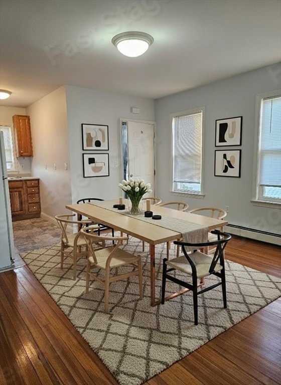 403 Manchester Street, Unit 3 Fall River, MA 02721 - Photo 1 of 15 a view of a dining room with furniture and wooden floor