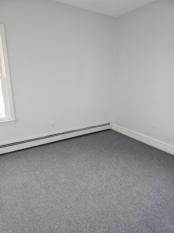 403 Manchester Street, Unit 3 Fall River, MA 02721 - Photo 11 of 15 an empty room with a window
